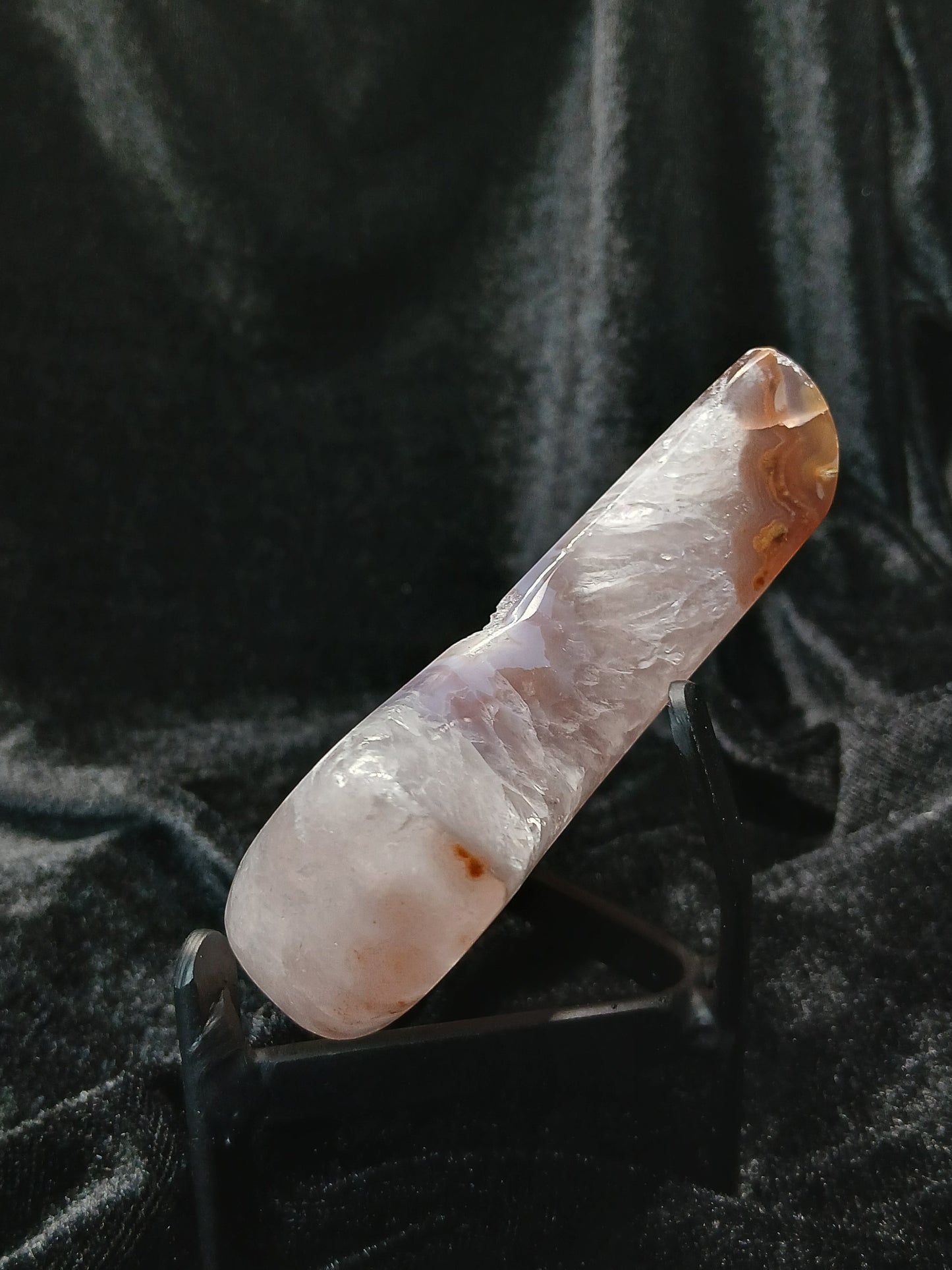 Fordite Haus: Crystals & Fordite 3.5-inch agate moon carving with druzy texture on a black display stand
