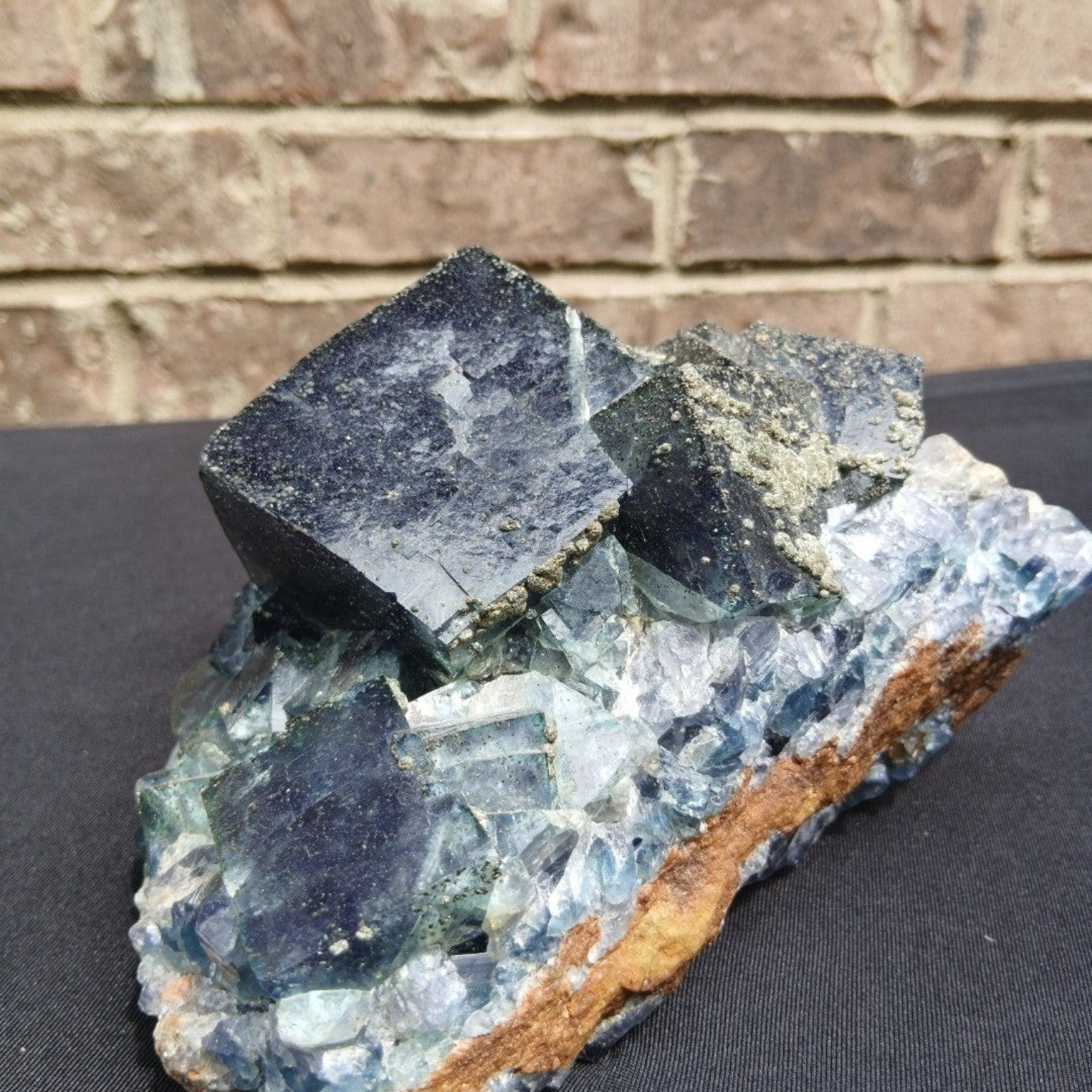 Fordite Haus: Crystals & Fordite cubic green Superior Mine fluorite mineral specimen with pyrite dusting
