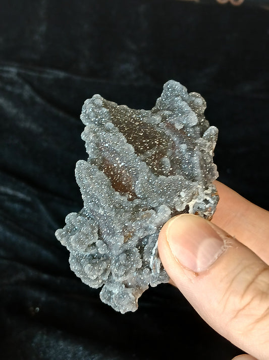 Fordite Haus: Crystals & Fordite gray manganese druzy quartz mineral specimen with sparkling crystalline texture