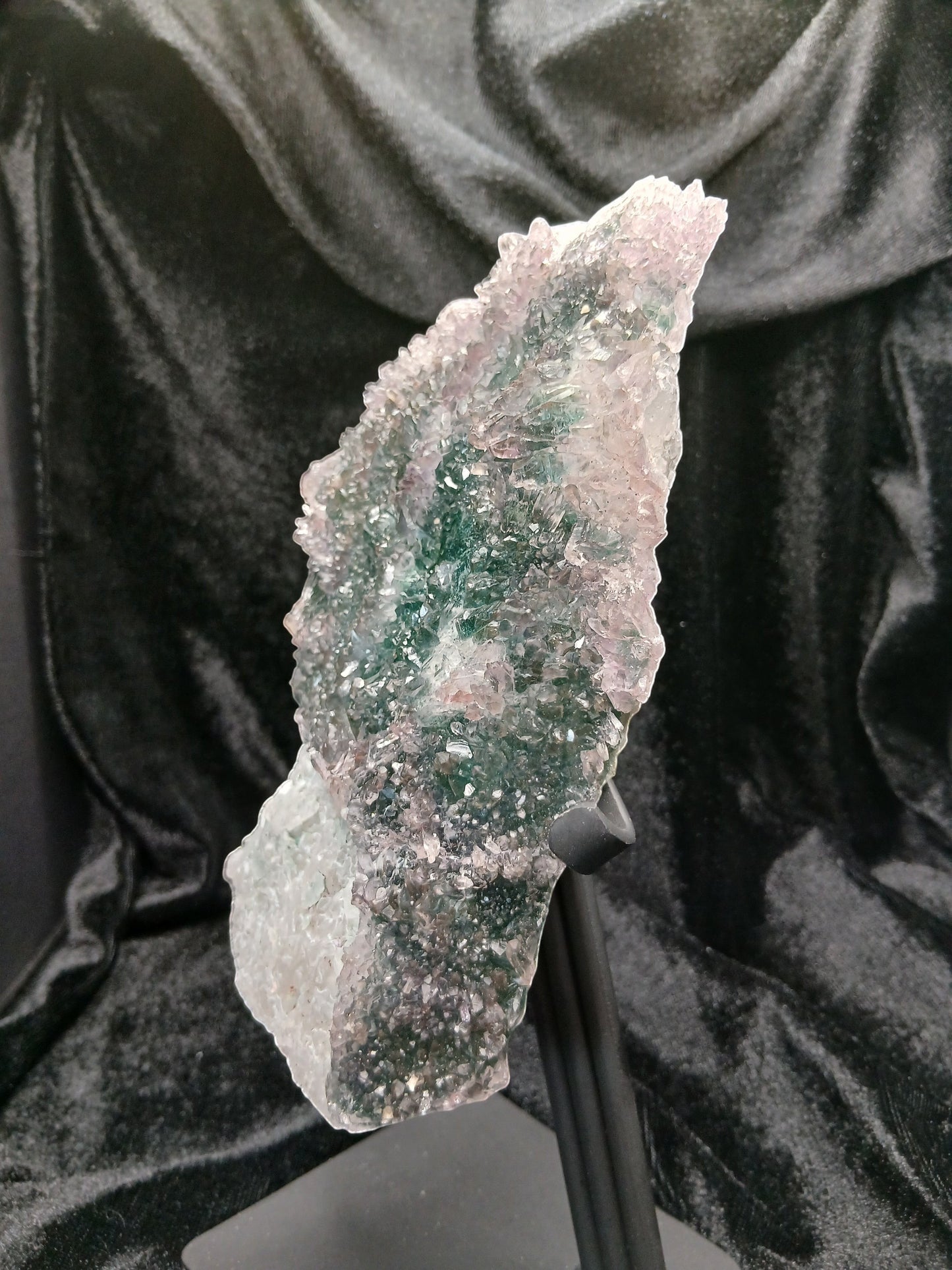 Fordite Haus: Crystals & Fordite green chalcedony and lavender amethyst flower crystal specimen on a black metal stand