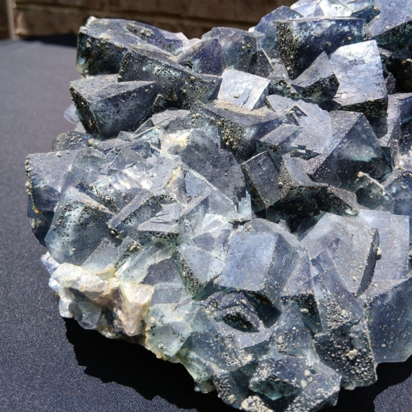 Fordite Haus: Crystals & Fordite large green Superior Mine fluorite crystal cluster with pyrite dusting.