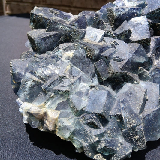 Fordite Haus: Crystals & Fordite large green Superior Mine fluorite crystal cluster with pyrite dusting.