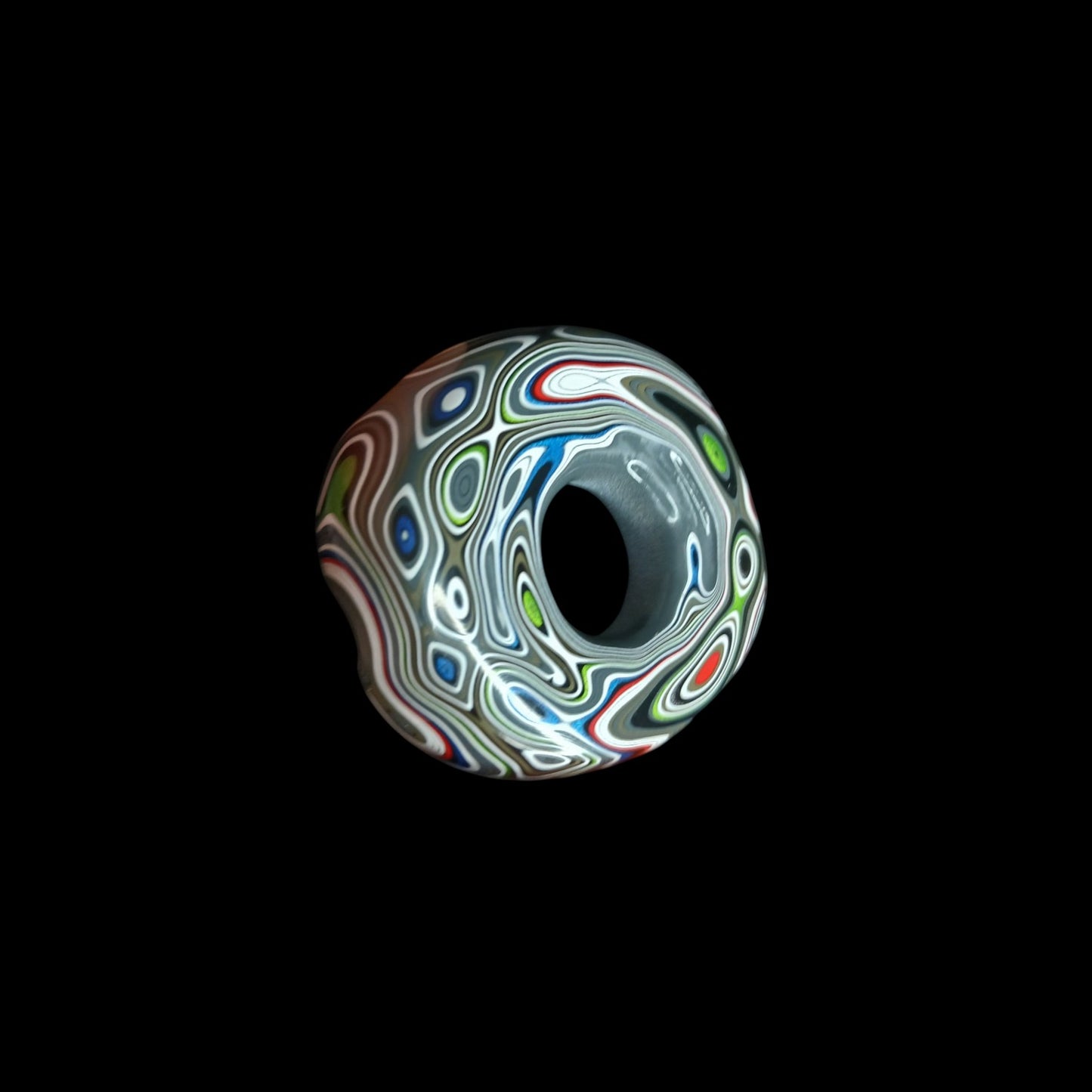 Fordite Haus: Crystals & Fordite Jeepite sphere stand featuring polished, multi-colored automotive paint layers.