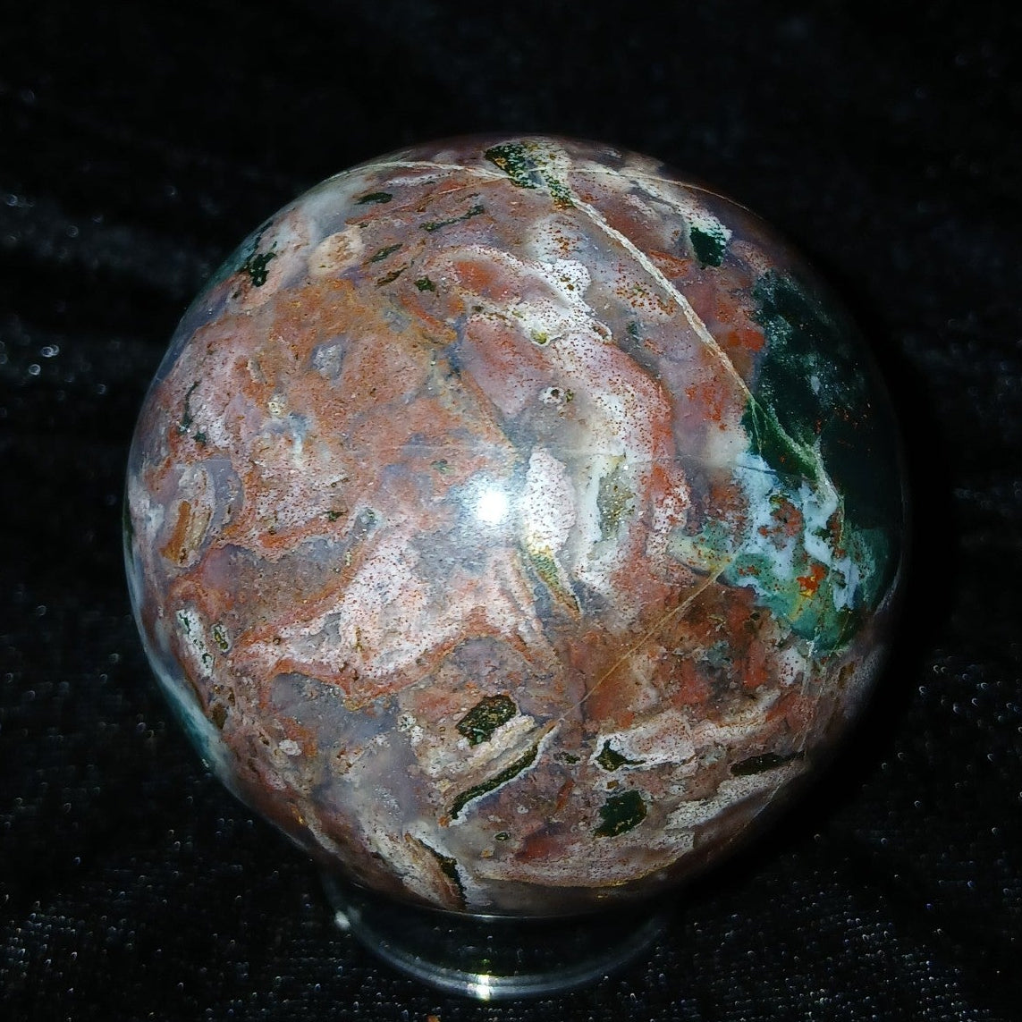Fordite Haus: Crystals & Fordite 57.4mm Ocean Jasper sphere from Madagascar with swirling green and brown patterns