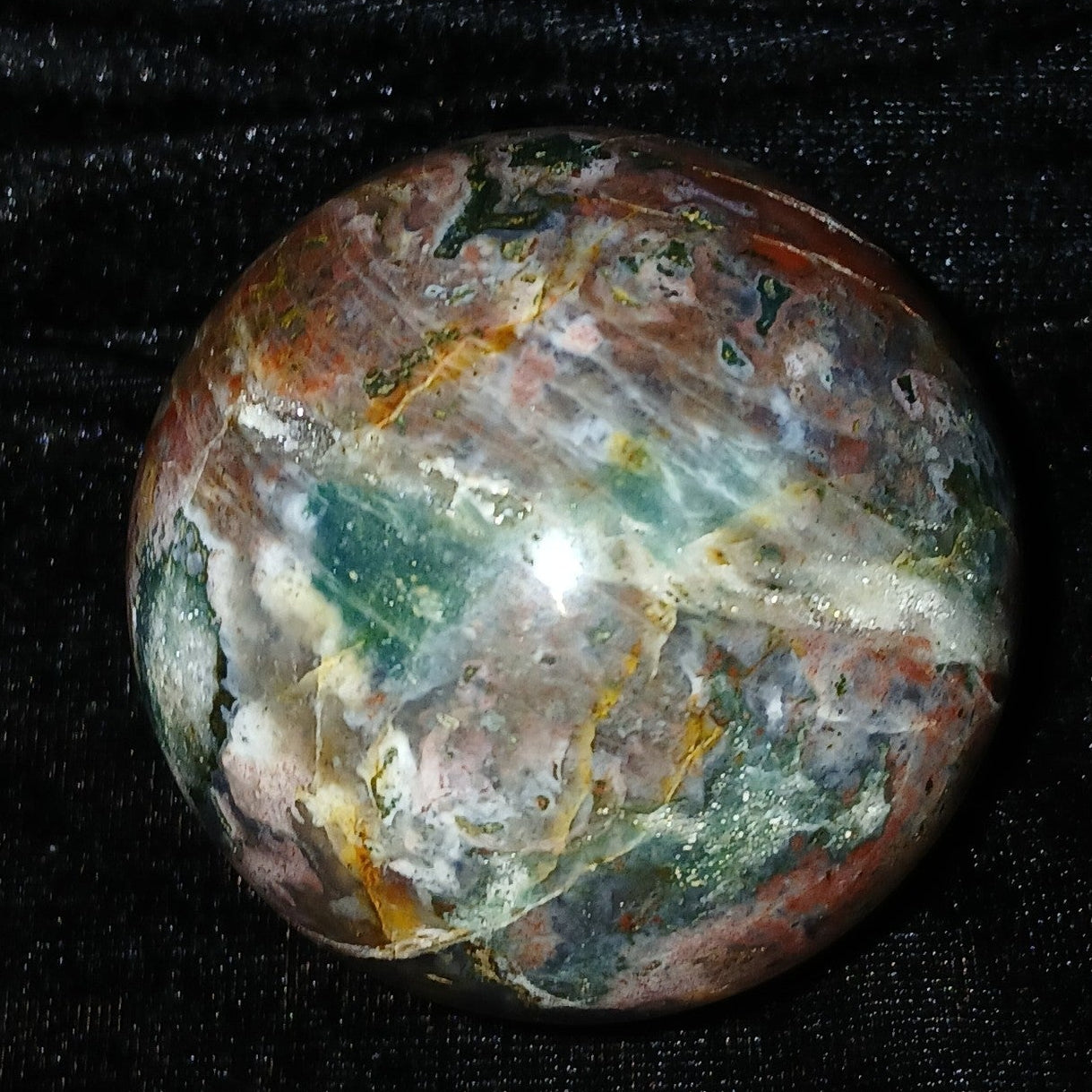 Fordite Haus: Crystals & Fordite 61mm Ocean Jasper sphere from Madagascar featuring multi-colored orbicular patterns