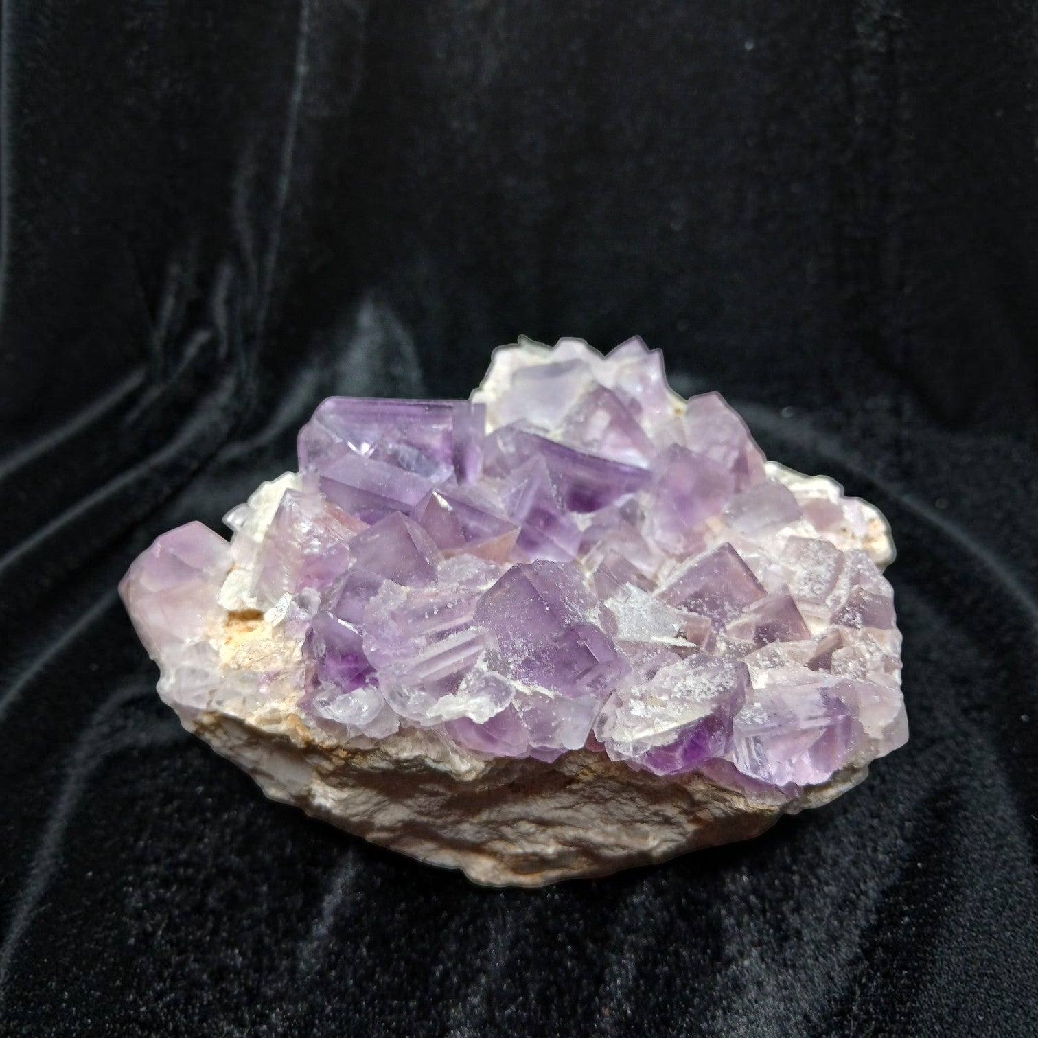 Fordite Haus: Crystals & Fordite purple fluorite mineral specimen from La Viesca Mine with cubic crystal formations.