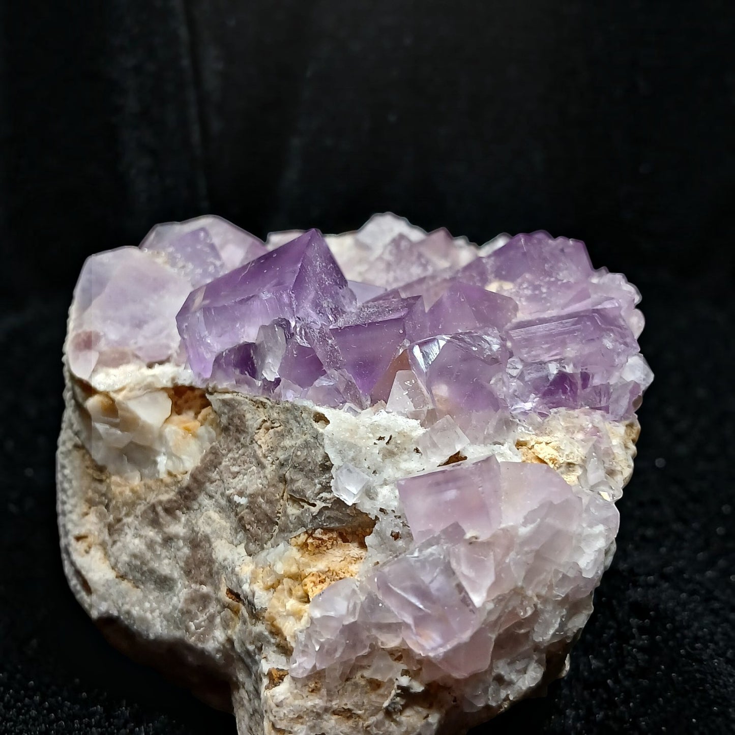 Fordite Haus: Crystals & Fordite La Viesca purple fluorite mineral specimen with cubic crystals on matrix