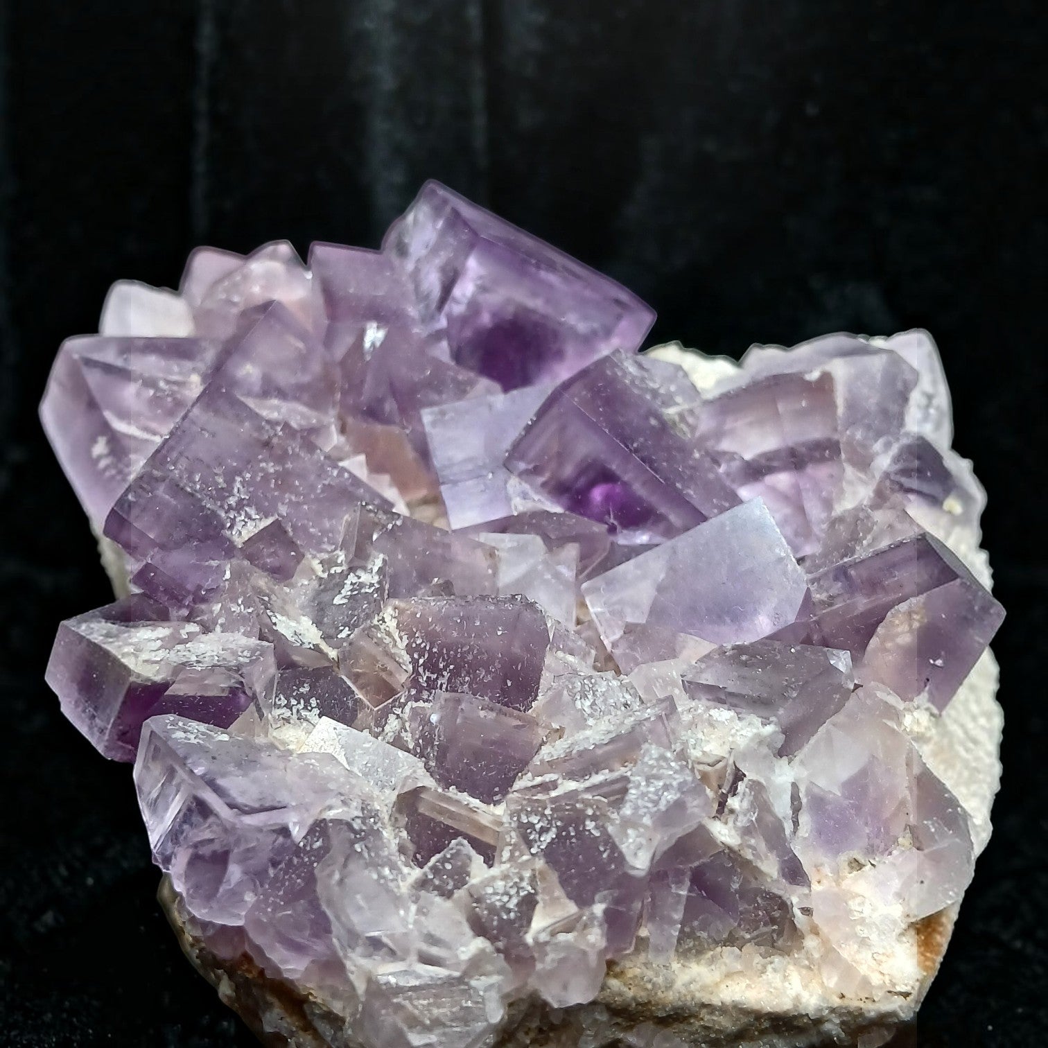 Fordite Haus: Crystals & Fordite purple fluorite mineral specimen from La Viesca Mine with translucent cubic crystals.