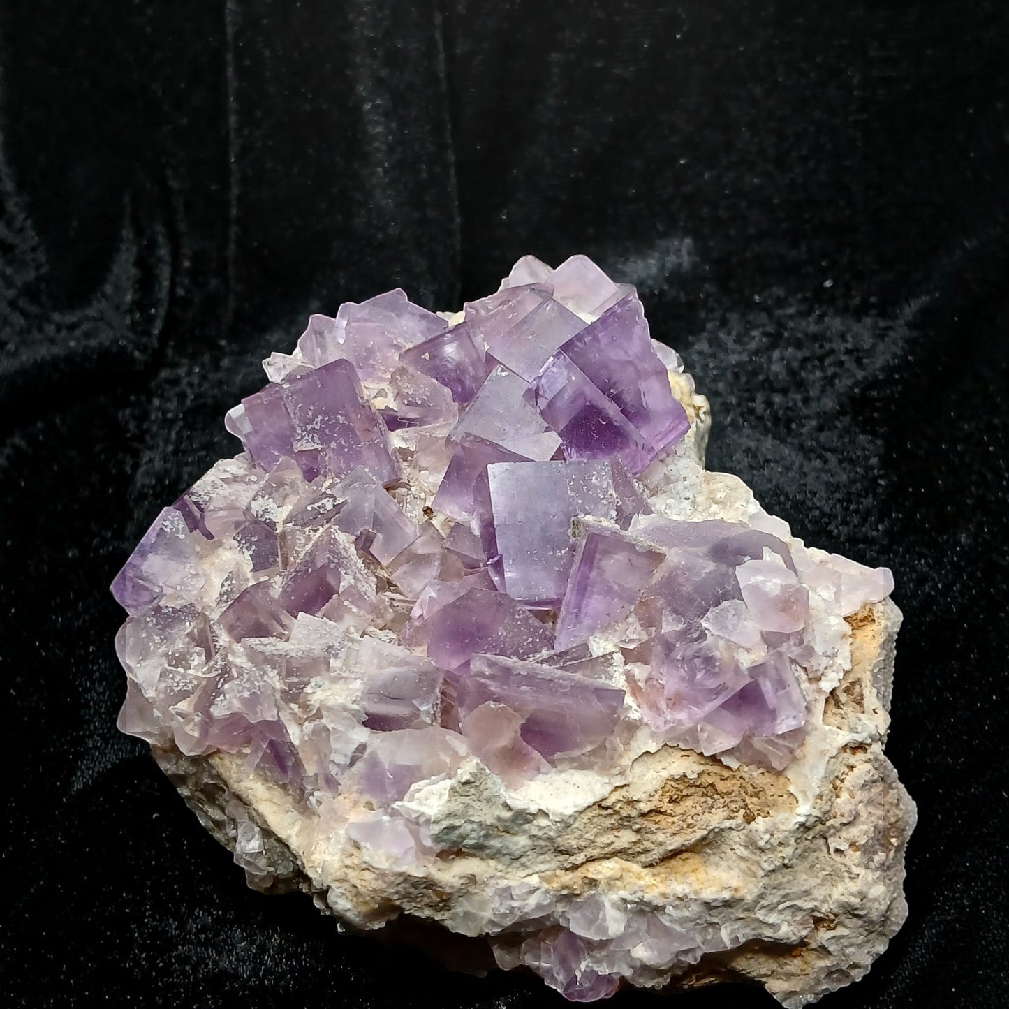 Fordite Haus: Crystals & Fordite purple fluorite mineral specimen from La Viesca Mine with cubic crystal formations.